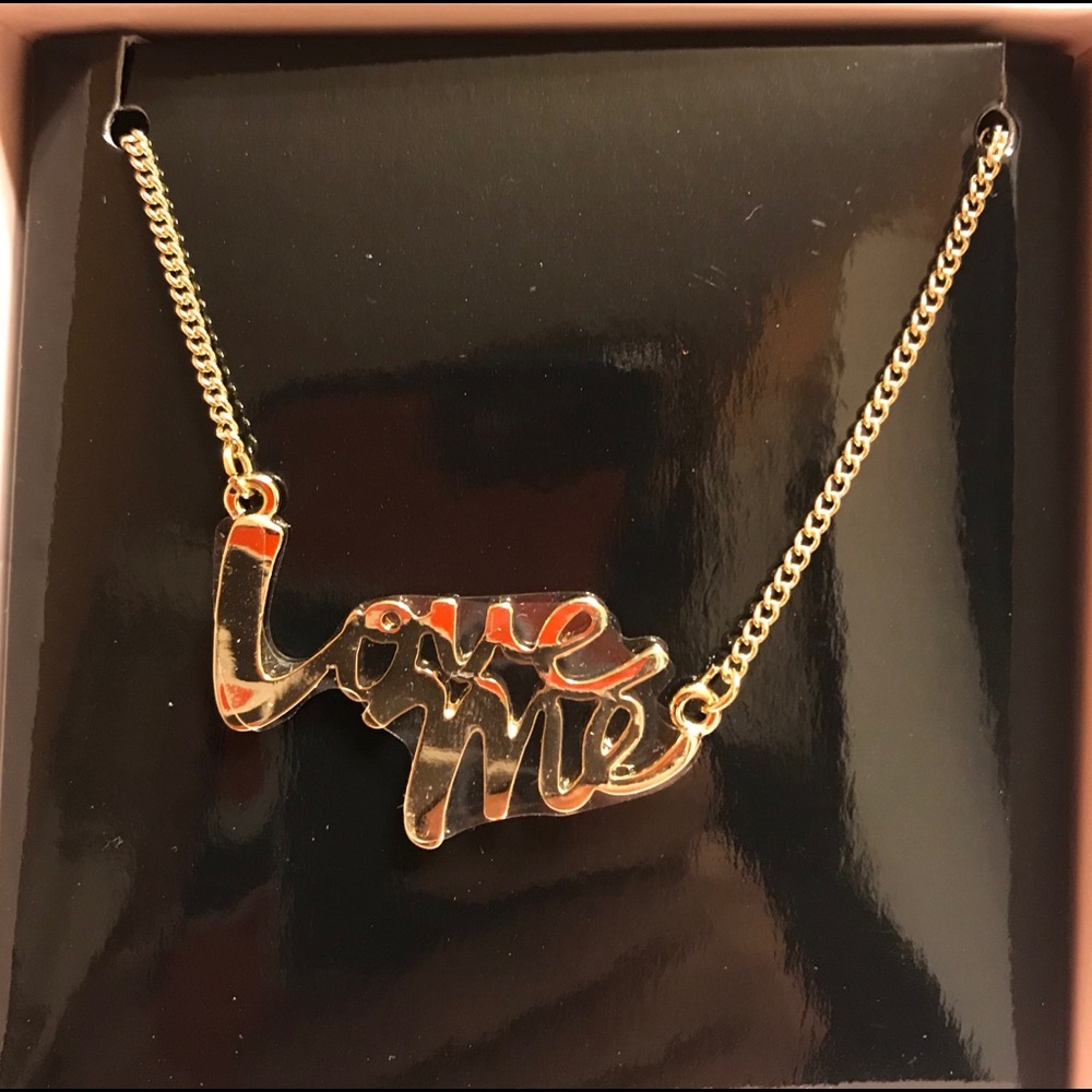 Victoria’s Secret gold plated “Love Me” necklace.